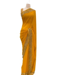 Yellow Georgette Saree with Gold Border