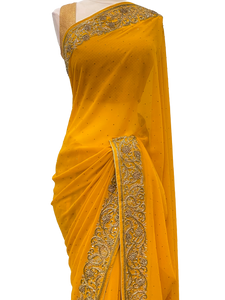 Yellow Georgette Saree with Gold Border